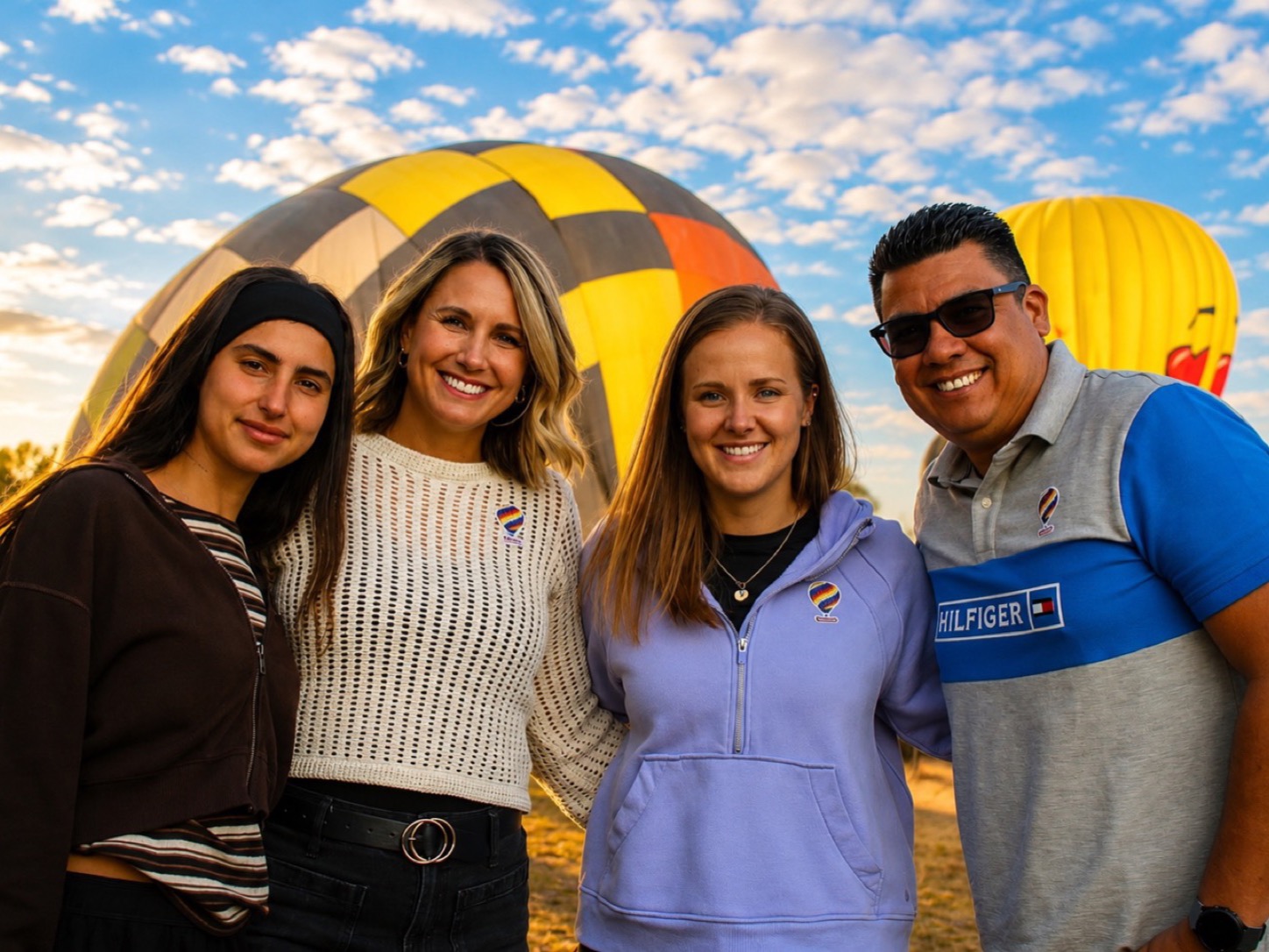 Friends celebrating their balloon experience together